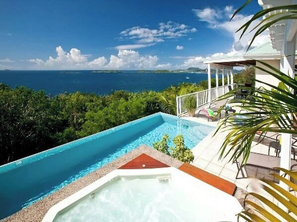 As you sit & relax in your hot tub, you will enjoy gazing out to Great Cruz Bay and across to St. Thomas