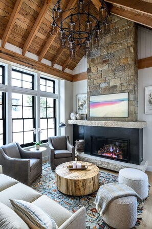 Living Room - Living room with gas fireplace, flat-screen TV and Sonos sound system