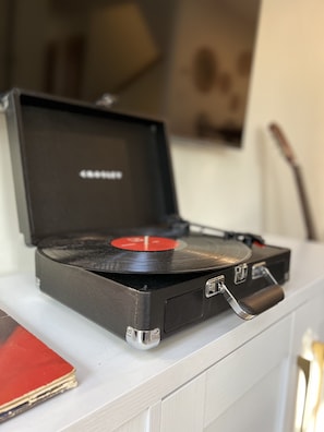 Play one of our vinyls or stream from your phone via bluetooth