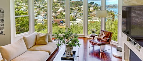 Living room with views of Sausalito and San Francisco Bay. 60" TV, Sonos.