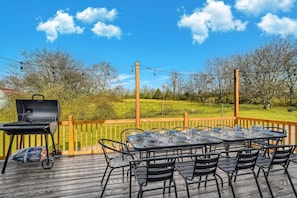 Treat yourself, family, and friends to our 12-person back porch entertainment area and grill some food on the BBQ!