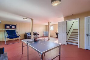 Treat your family to your own private Game Room; featuring Pink Pong, Basketball, a giant Connect 4 + our Office Desk Station, sofa that turns into a Queen bed, a baby station, and more!