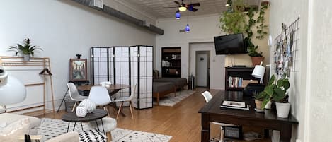 900 sq ft loft with living, dining, and office/art areas