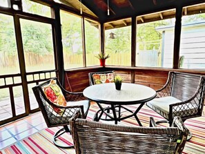 Covered, Screened-in Patio with Saltillo Tile off Living Room