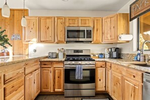 Come stay and enjoy the fully stocked kitchen, complete with stainless steel appliances, granite countertops, a full coffee bar, all of the cooking necessities and more!