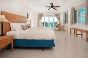 Master Bedroom - Sleep soundly on our fresh linens and comfortable bed space, and wake up to the sound of calming ocean waves.