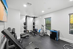 Full olympic gym, rack, 5-95lb dumbbells, bike, elliptical.  Awesome!