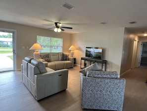 Family room view when entering from the carport, master BR is down the hall.