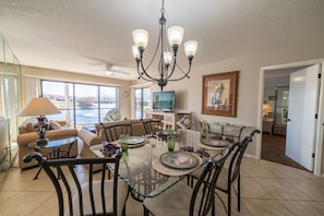 Enjoy this beautiful open floor plan great room overlooking the pond with plenty of seating!