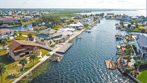 Aerial canal view of the home