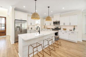 Open concept chef ready kitchen.