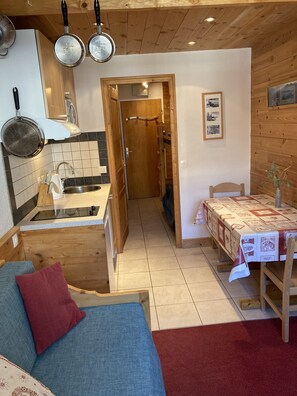 Kitchen/diner and door to bunk bedroom.