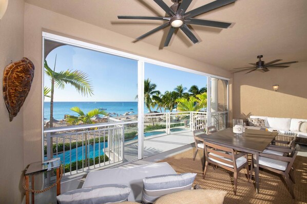 Screened furnished balcony.