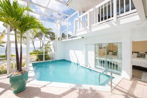 Private pool. Lower level suite has walkout access; upper suite has walkout balcony.