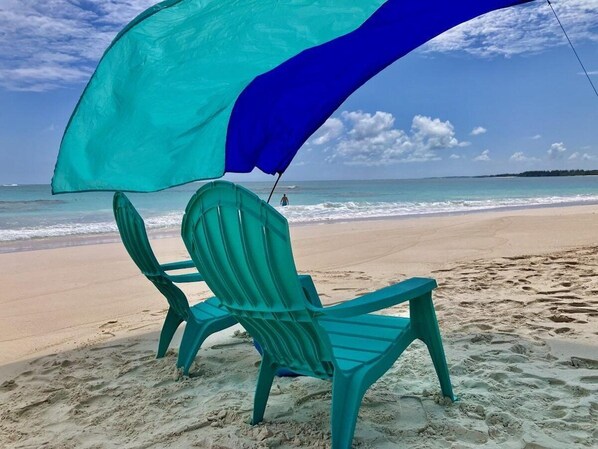 Our beautiful pink-sand beach.  Relax by the ocean, enjoy the wind and waves.
