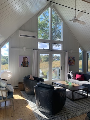 Light filled, modern beach cottage living room