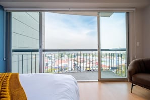 Relaxing bedroom with a balcony