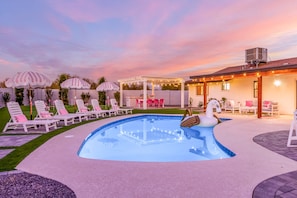 At the center of the backyard is a large pool, which can be heated for a fee!