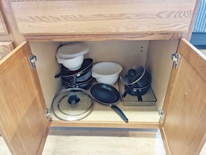 Pots and pans for cooking.