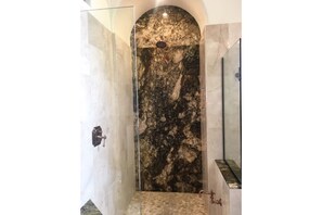 Your luxury marble shower with foot wash.