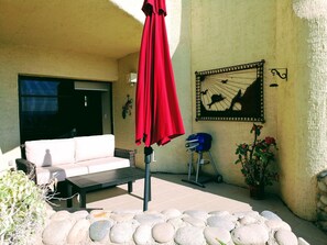 Super comfy over-sized love seat on the patio for enjoying the view. 
