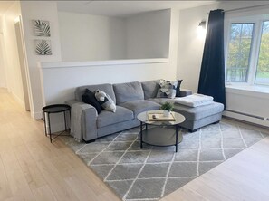 Comfortable sectional in living room area.