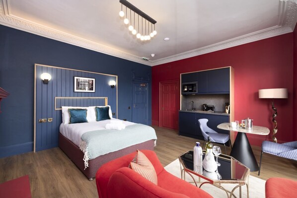 Studio with bed and kitchen