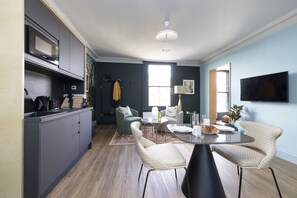 Studio with bed and kitchen