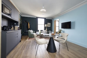 Studio with bed and kitchen