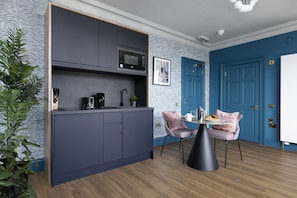 Studio with bed and kitchen