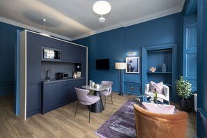 Studio with bed and kitchen
