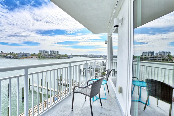 Watch the boats go by from your corner unit balcony!