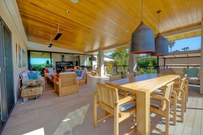 Custom made outdoor dining table seating for eight, all teak