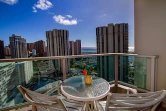 Central studio with balcony and gorgeous ocean views.