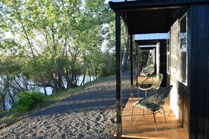 Cabin row by the pond