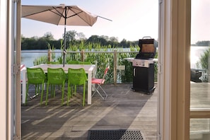 Dock Holiday has a private decking area with outdoor furniture, gas barbecue and jetty