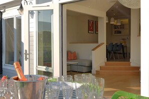 Secure private decking area with outdoor furniture, gas barbecue and stunning views
