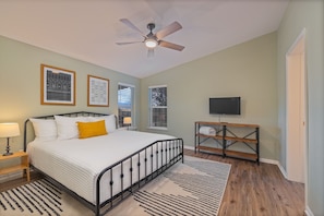 Master bedroom with king bed and en suite bath