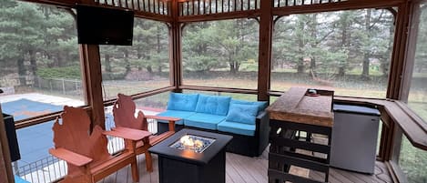 Outdoor Gazebo with fireplace, tv, bar and mini fridge