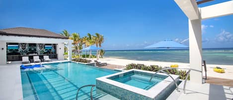 Pergolas surround the pool deck for shade