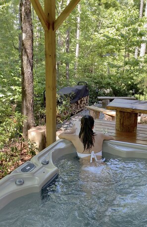 enjoy the hat tub all year around surrounded by nature