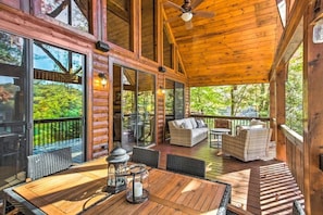 Main level deck with ample seating and lovely lake views