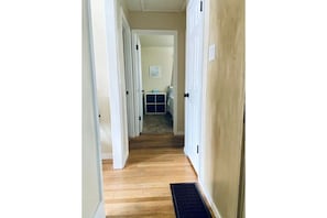 Hallway to bedrooms and bath