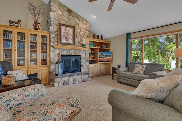 Gorgeous great room with gas fireplace and Smart TV