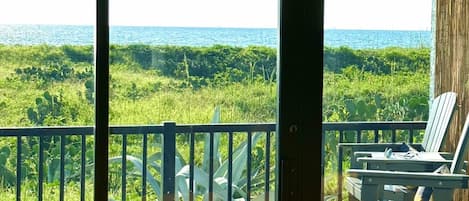 GORGEOUS view of the ocean from the high, comfortable Adirondack chairs….