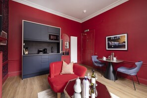Studio with bed and kitchen