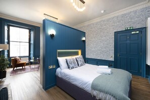 Studio with bed and kitchen