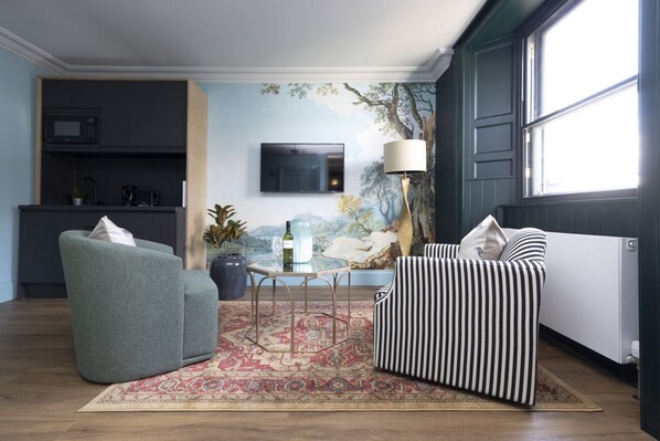 Studio with bed and kitchen
