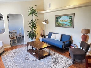 Living room with view to the dining room.