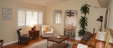 Wider angle view of livingroom towards dining room.